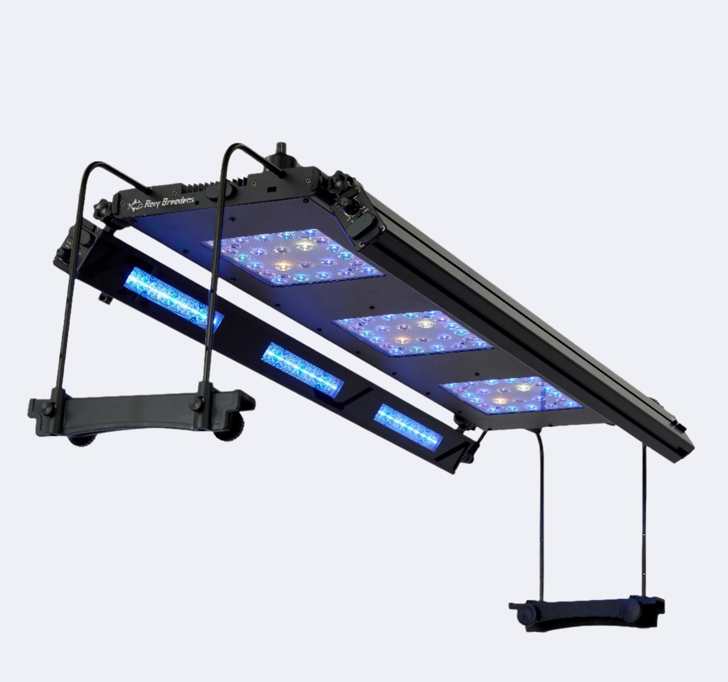 Meridian 35 LED light suspended with side legs, showing 2 edge bars attached and angled inwards. Optional manual controller on top of light.