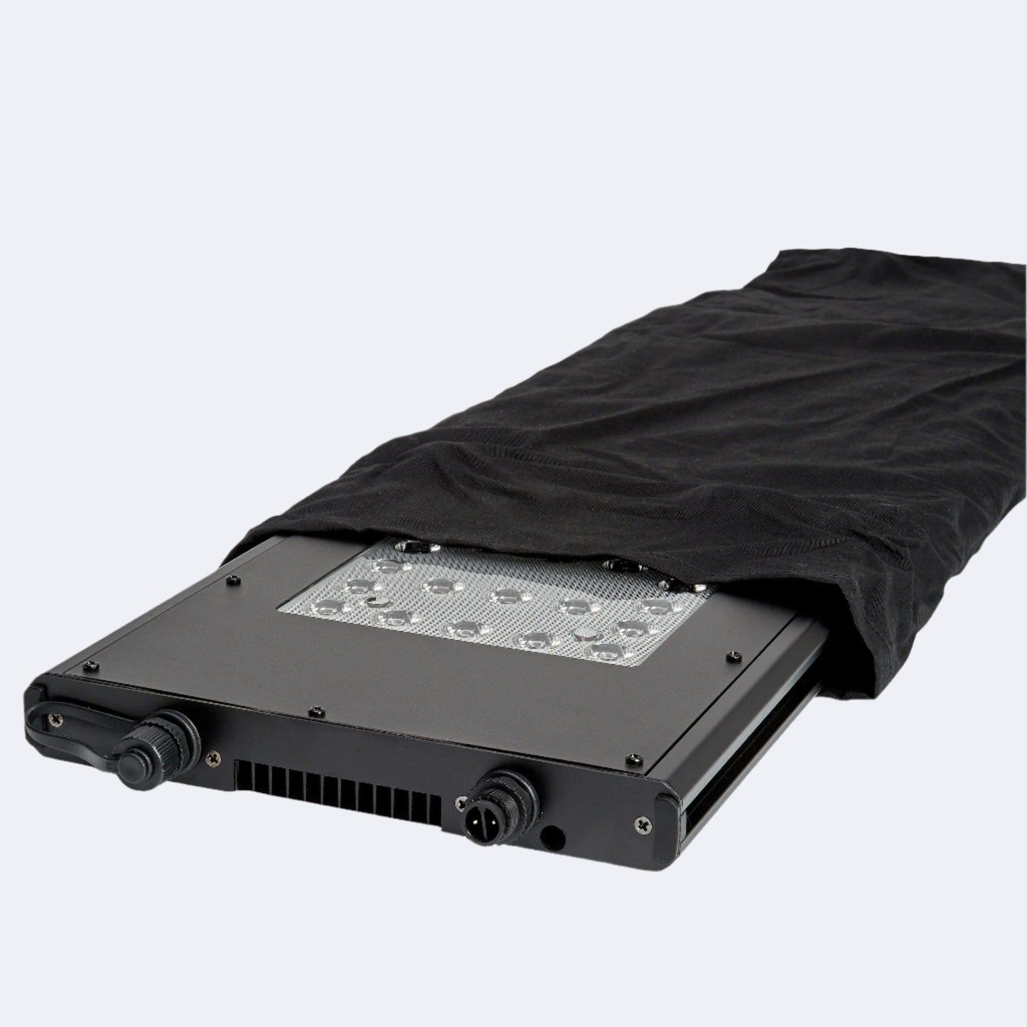 Meridian partially covered by black cotton sleeve used in packaging. Pictured with LEDs off and facing upwards.
