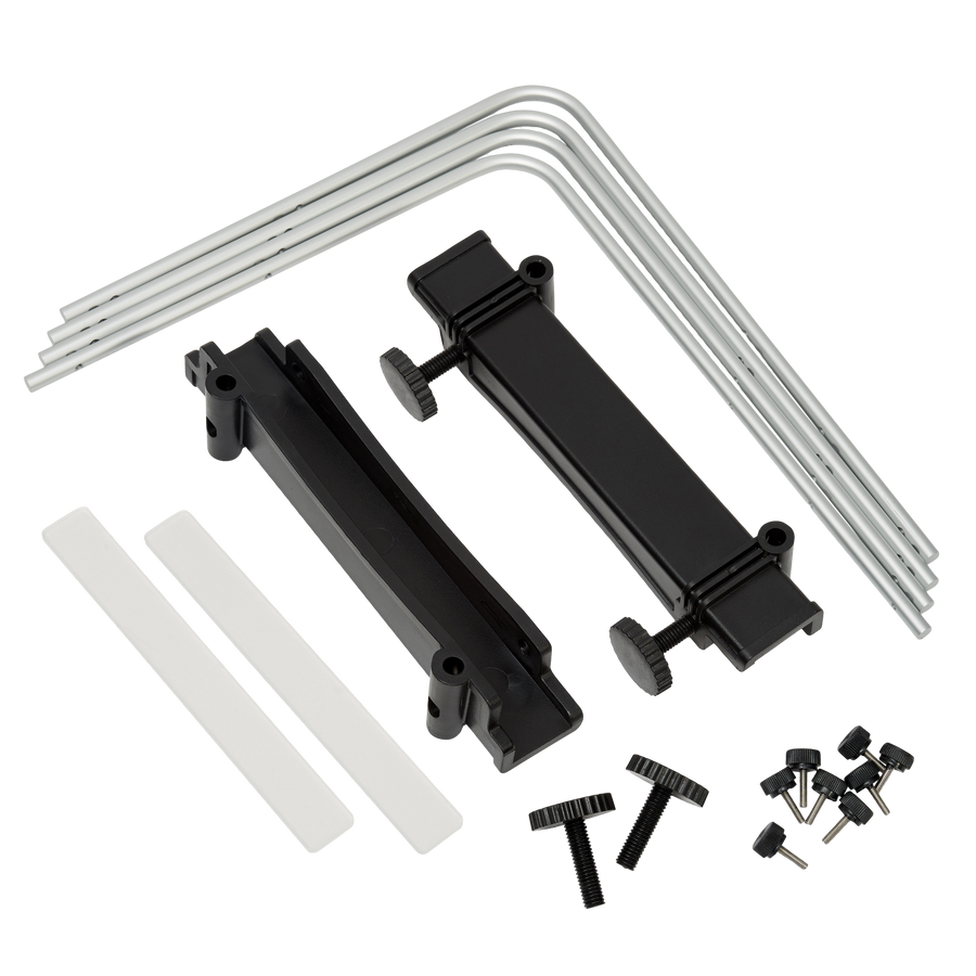 The silver side of tank mount kit laid out: four L-shaped leg bars, two U-clamps and the screw set.